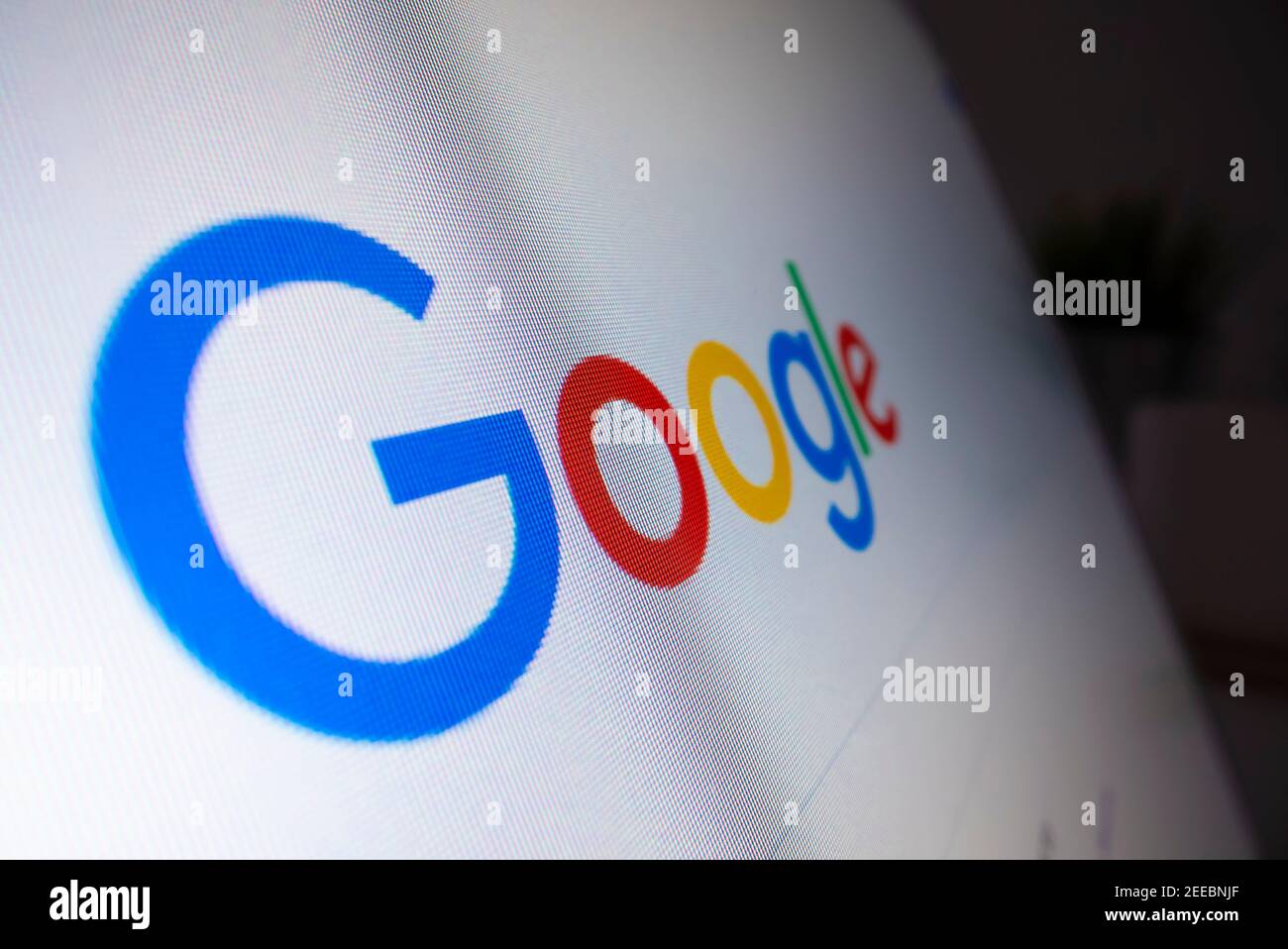 Macro view of Google logo on a computer running Chrome browser Stock Photo