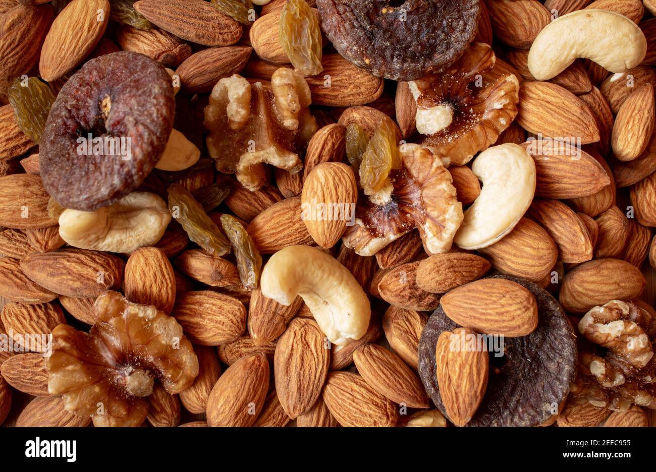 Mix of dry fruits containing almonds, walnuts, raisins and dried figs
