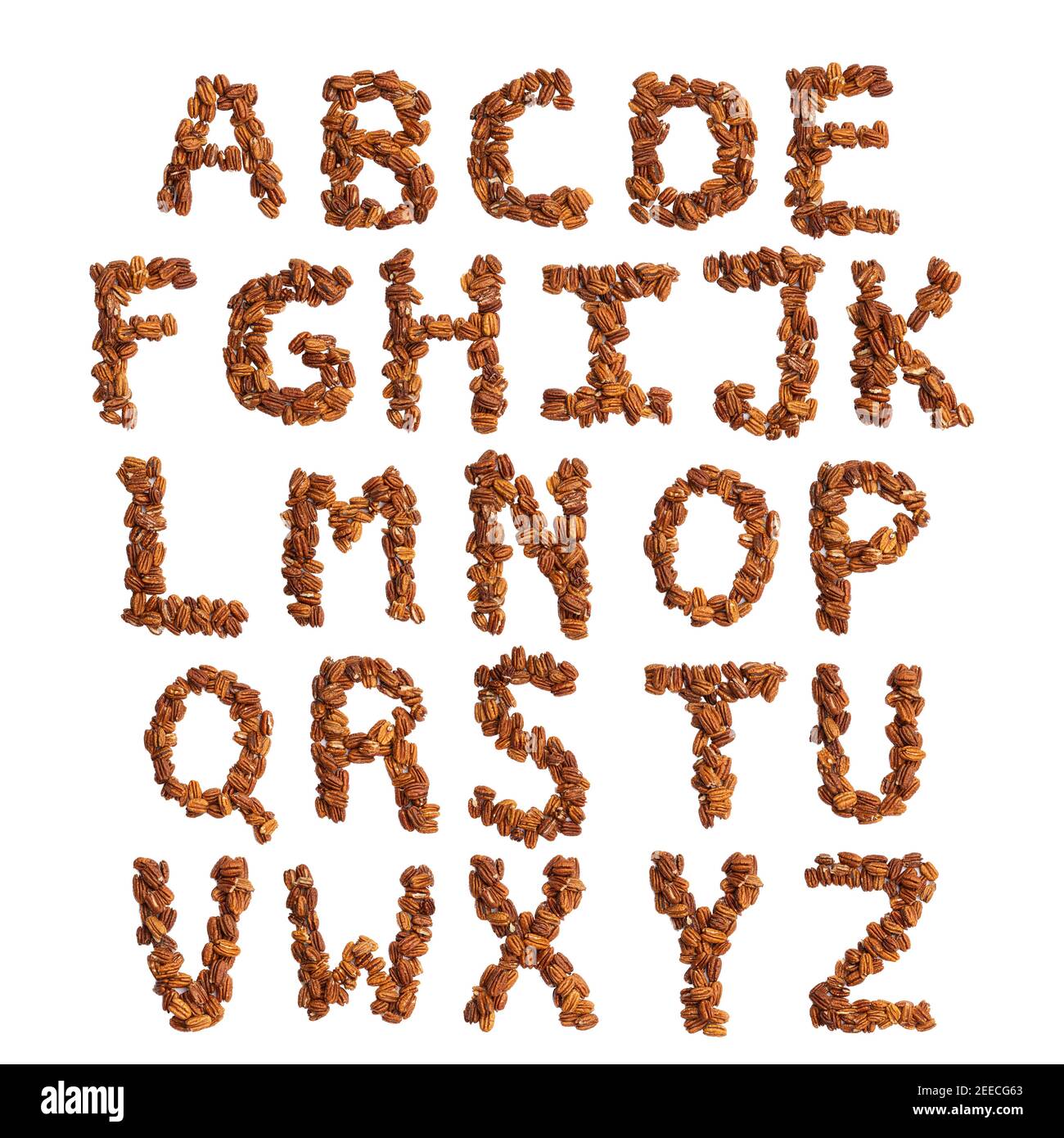 English alphabet from pecans on a white isolated background. Food