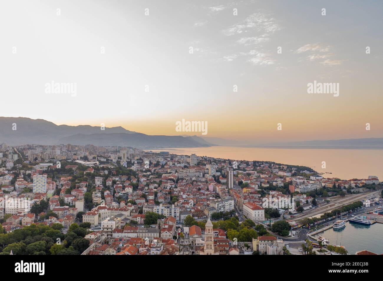 Aerial drone shot of Split city in sunrise hour with view of Mount Morso in Croatia Stock Photo