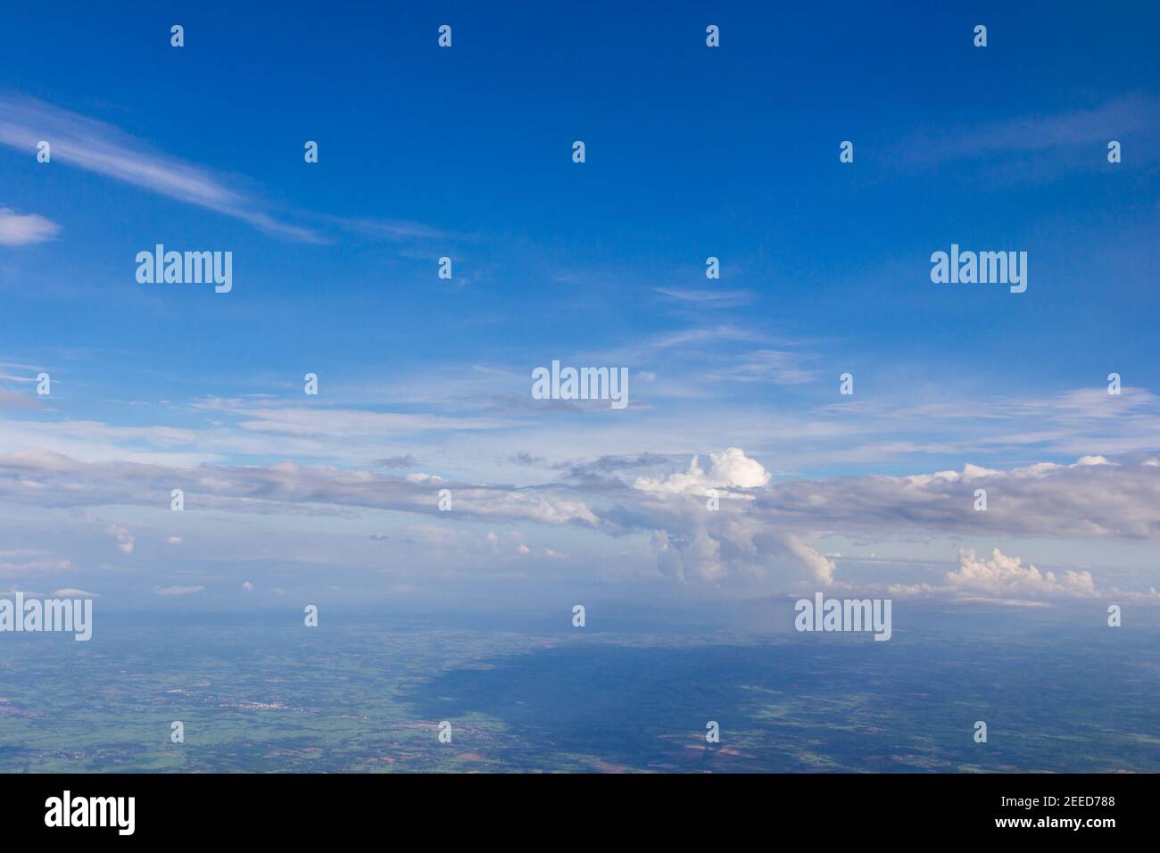 Blue sky land and white cloud background Stock Photo Alamy