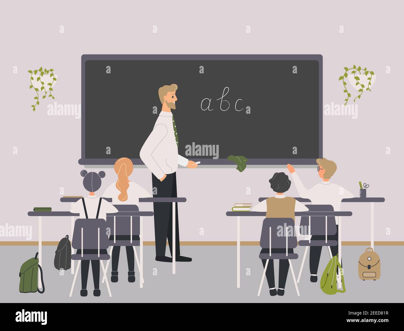 Male teacher of Philology explaining english letters to elementary school pupils or children near chalkboard. Man teaching language or writing to kids Stock Photo