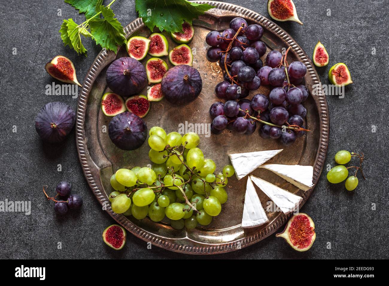 Wine snack set, fruit and cheese, wine food on platter, top view Stock ...