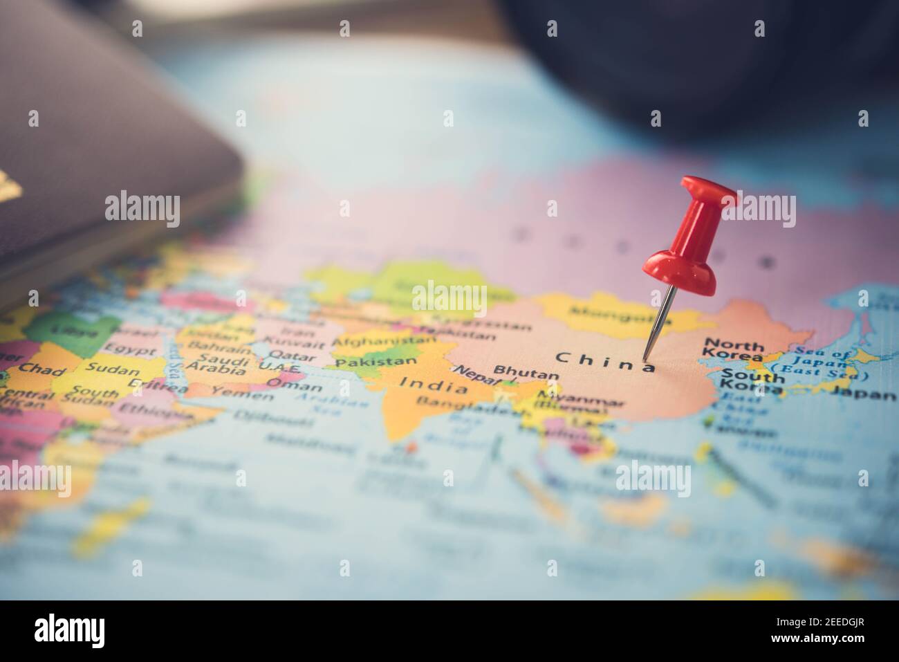 Red thumbtack pin on the map using to plan adventure holiday trip to northeast China Stock Photo