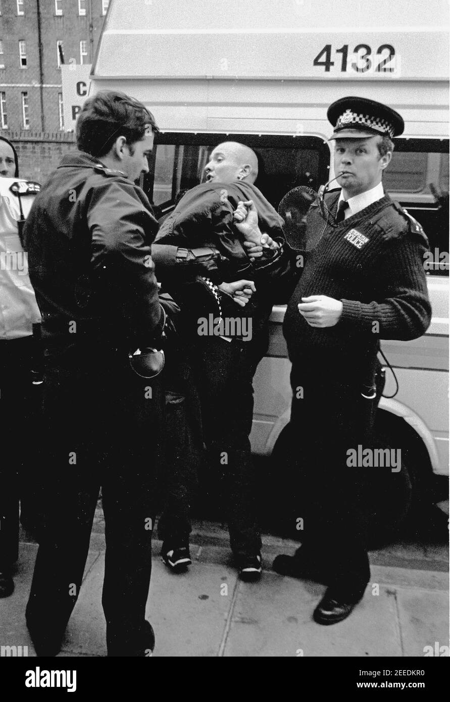 Police arresting protesters at the Camden High Street Reclaim The Streets anti car protest, London, 14th May 1995 Stock Photo