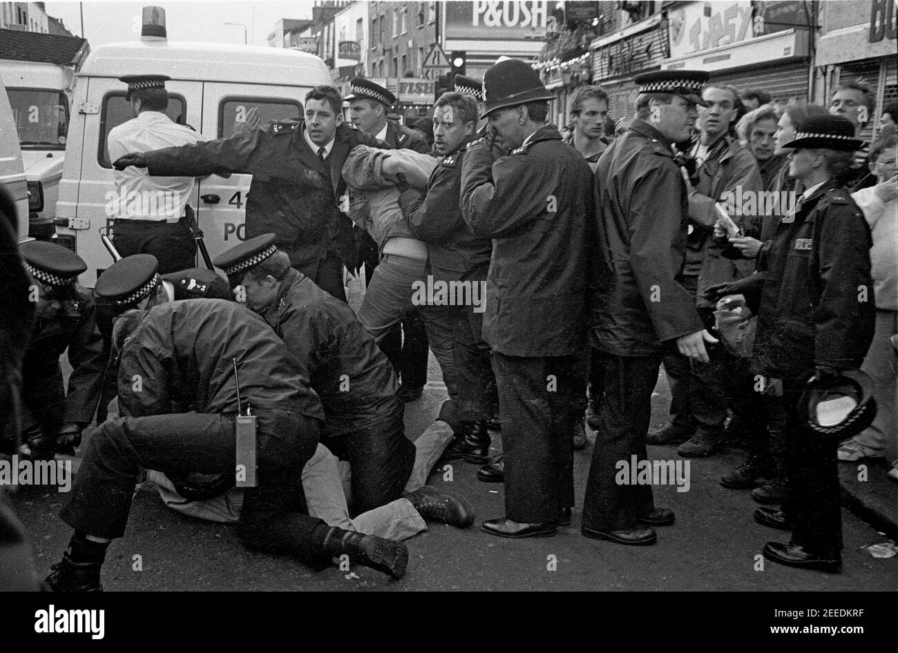 Police arresting protesters at the Camden High Street Reclaim The Streets anti car protest, London, 14th May 1995 Stock Photo