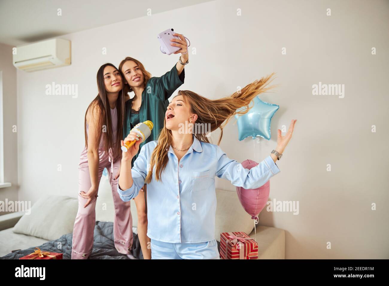 Three female friends having a good time Stock Photo