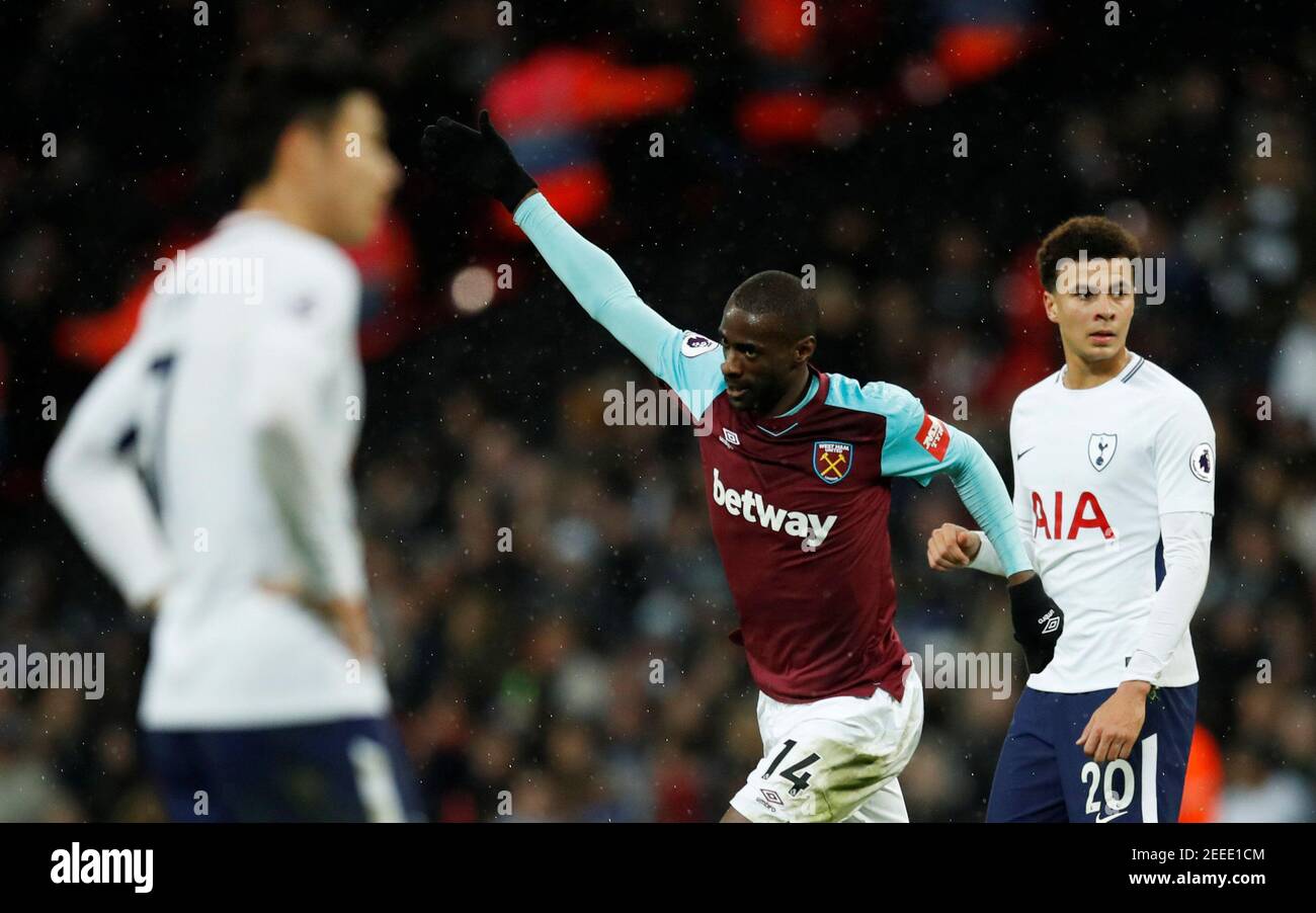 Soccer Football - Premier League - Tottenham Hotspur vs West Ham United - Wembley Stadium, London, Britain - January 4, 2018   West Ham United's Pedro Obiang celebrates scoring their first goal as Tottenham's Dele Alli looks on   REUTERS/Eddie Keogh    EDITORIAL USE ONLY. No use with unauthorized audio, video, data, fixture lists, club/league logos or 'live' services. Online in-match use limited to 75 images, no video emulation. No use in betting, games or single club/league/player publications.  Please contact your account representative for further details. Stock Photo
