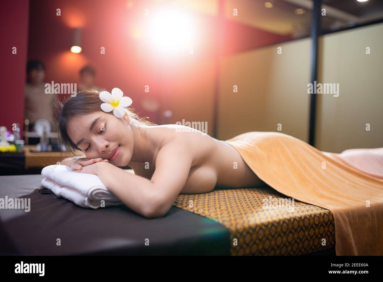 Young Beautiful Asian Woman relax massage in spa salon Stock Photo