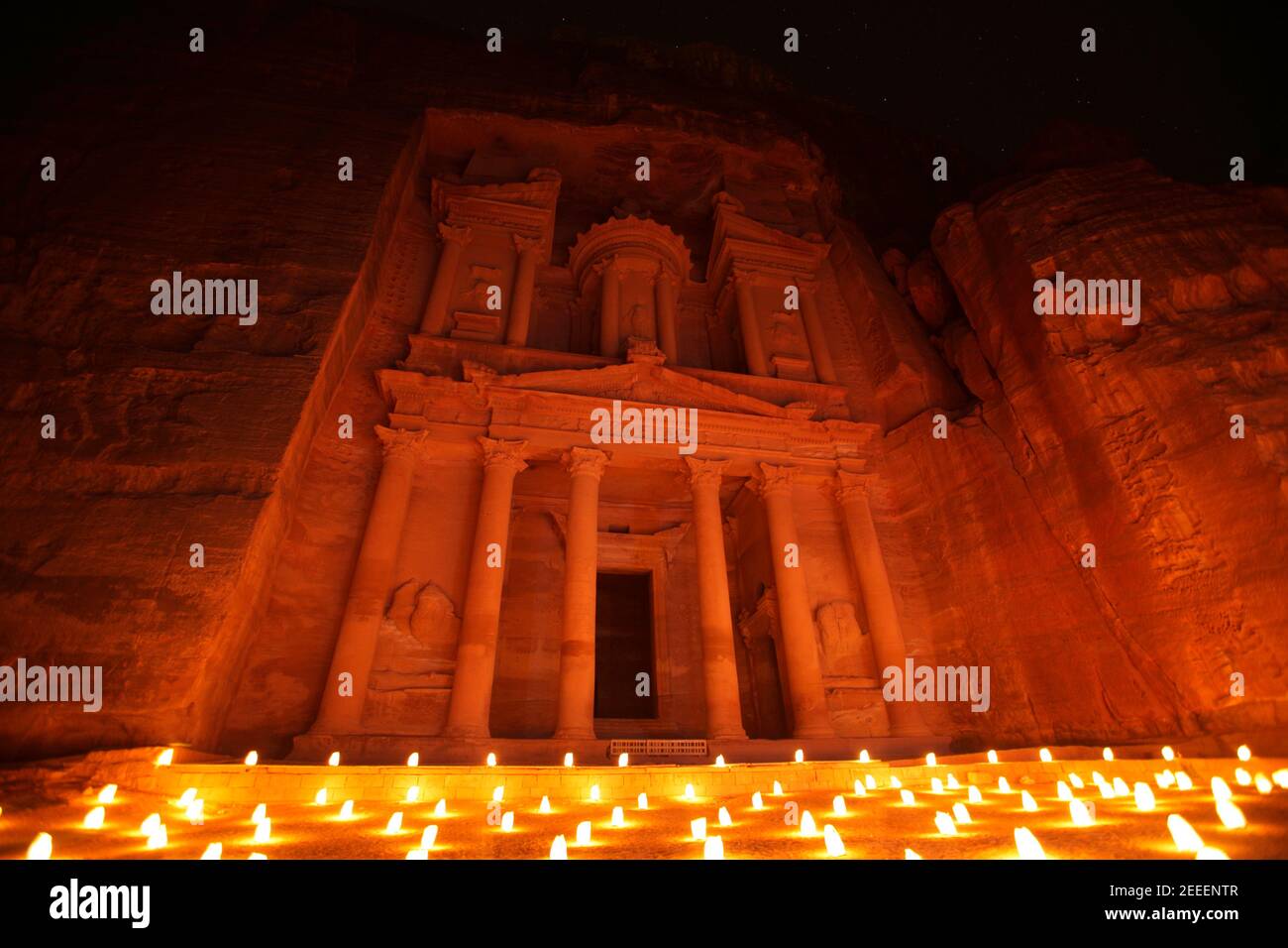 Al Khazneh (or Treasury) by night illuminated by candlelight, Petra, Jordan Stock Photo