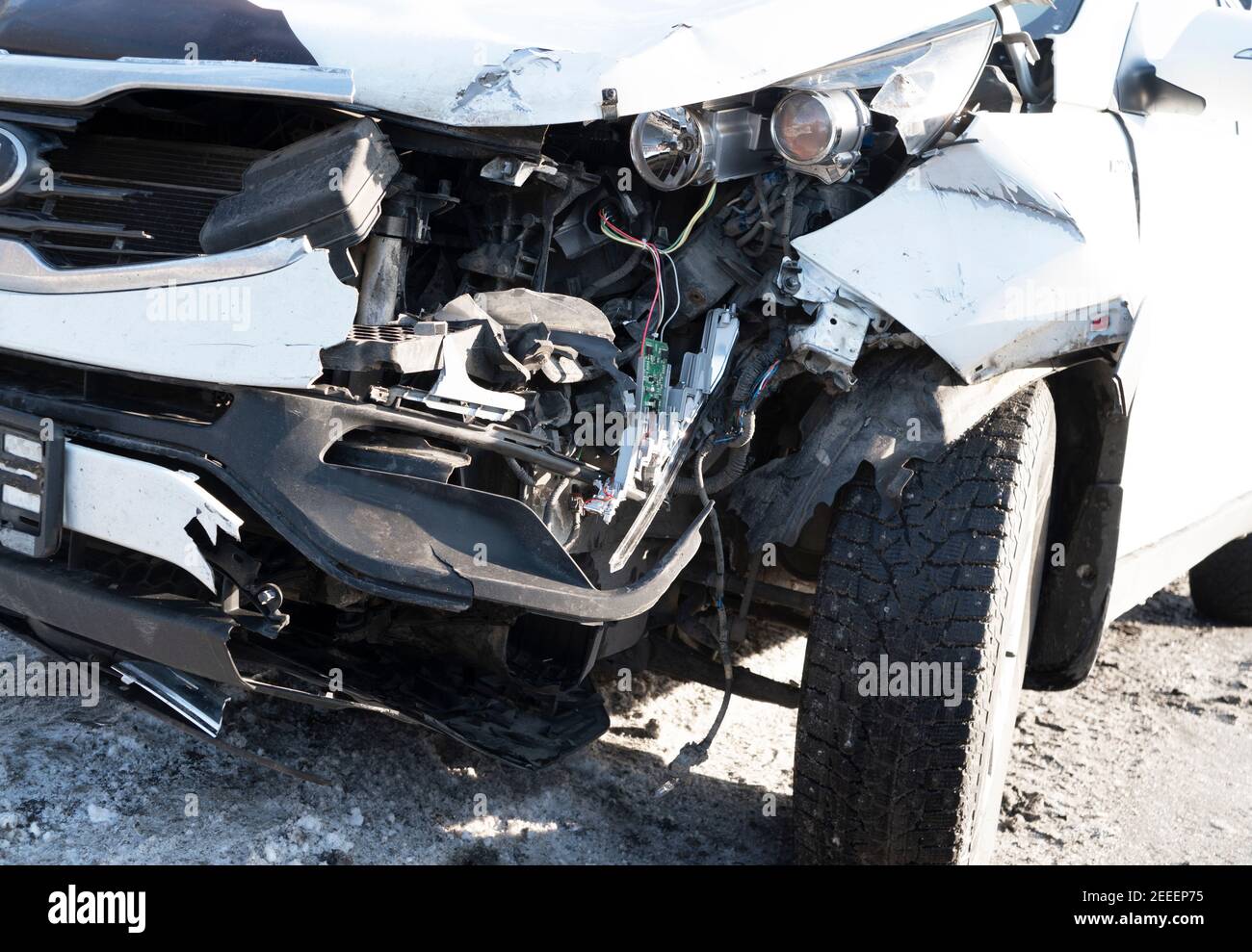 A white car crashed accident. Car accident on the road. Car crash