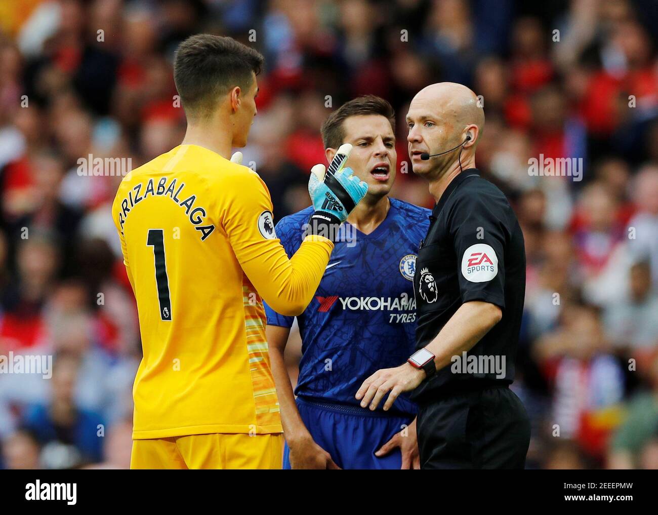 Soccer Football - Premier League - Manchester United v Chelsea - Old Trafford, Manchester, Britain - August 11, 2019  Chelsea's Kepa Arrizabalaga and Cesar Azpilicueta protest to referee Anthony Taylor after Manchester United are awarded a penalty  REUTERS/Phil Noble  EDITORIAL USE ONLY. No use with unauthorized audio, video, data, fixture lists, club/league logos or 'live' services. Online in-match use limited to 75 images, no video emulation. No use in betting, games or single club/league/player publications.  Please contact your account representative for further details. Stock Photo