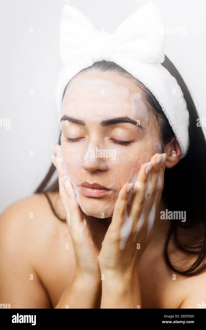 woman applying Facial Cleanser Stock Photo Alamy