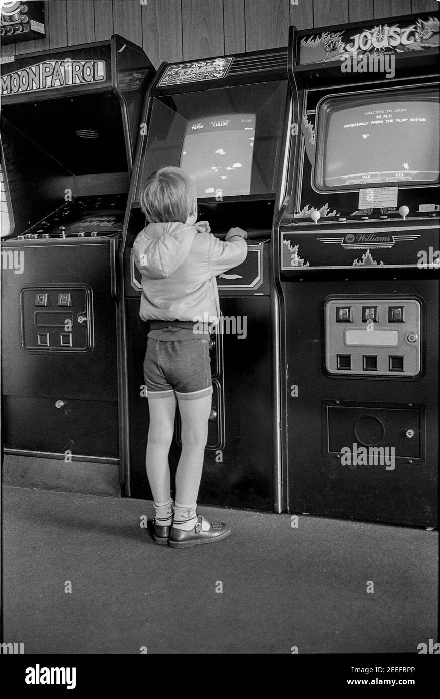 Boy playing video game Black and White Stock Photos & Images - Alamy