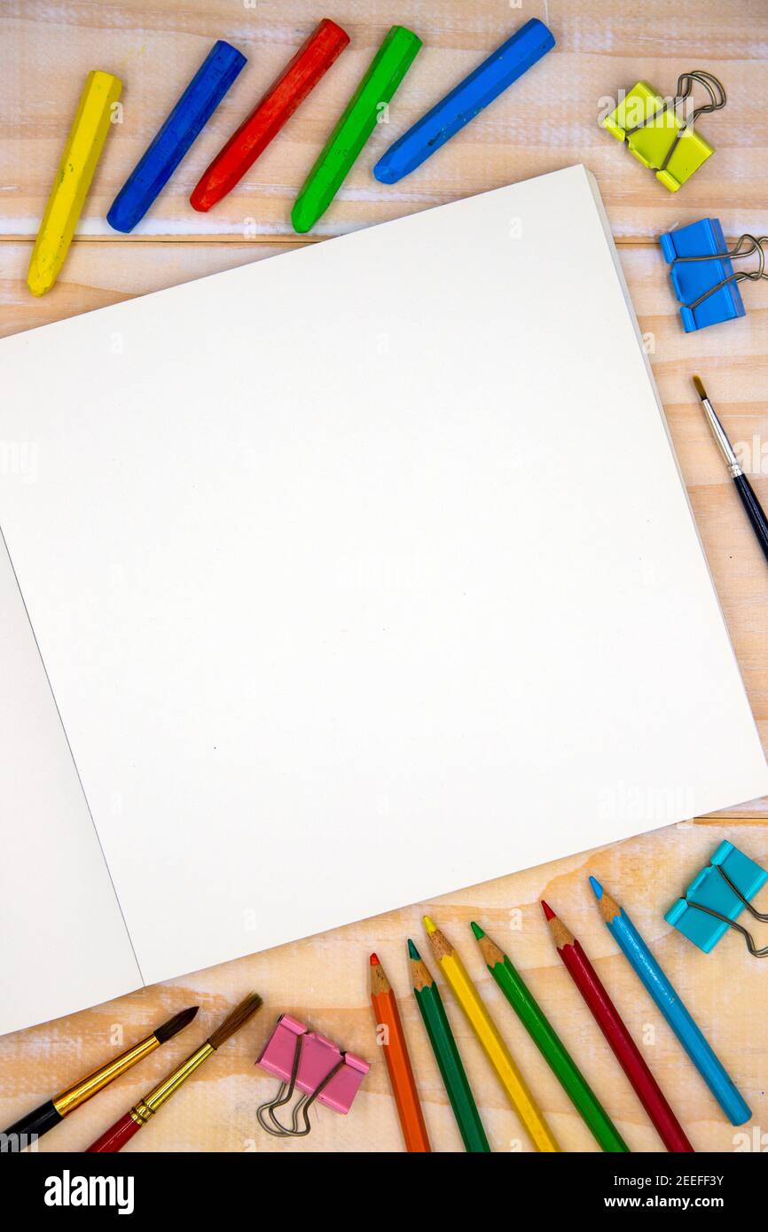 Blank Sketchbook On Wooden Table With Crayons Stock Photo - Download Image  Now - Sketch Pad, Blank, Empty - iStock