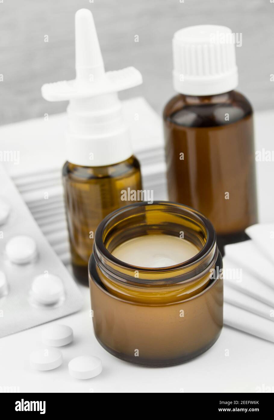 Cold medications with balm and mineral tablets Stock Photo