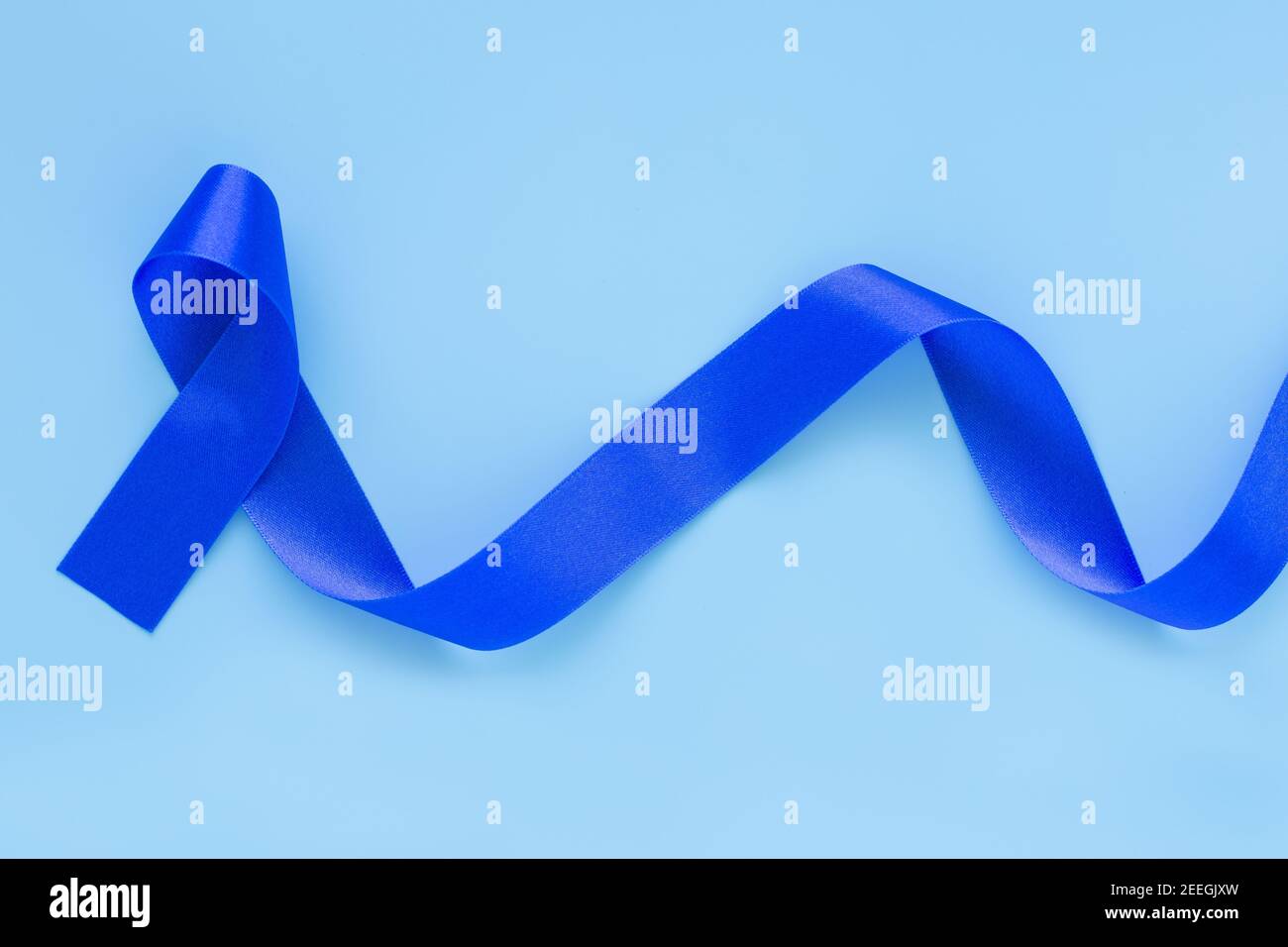 Blue awareness ribbon with trail on white background, Dark blue ribbon  symbolic for colon - colorectal cancer and Acute Respiratory Distress  Syndrome Stock Photo - Alamy