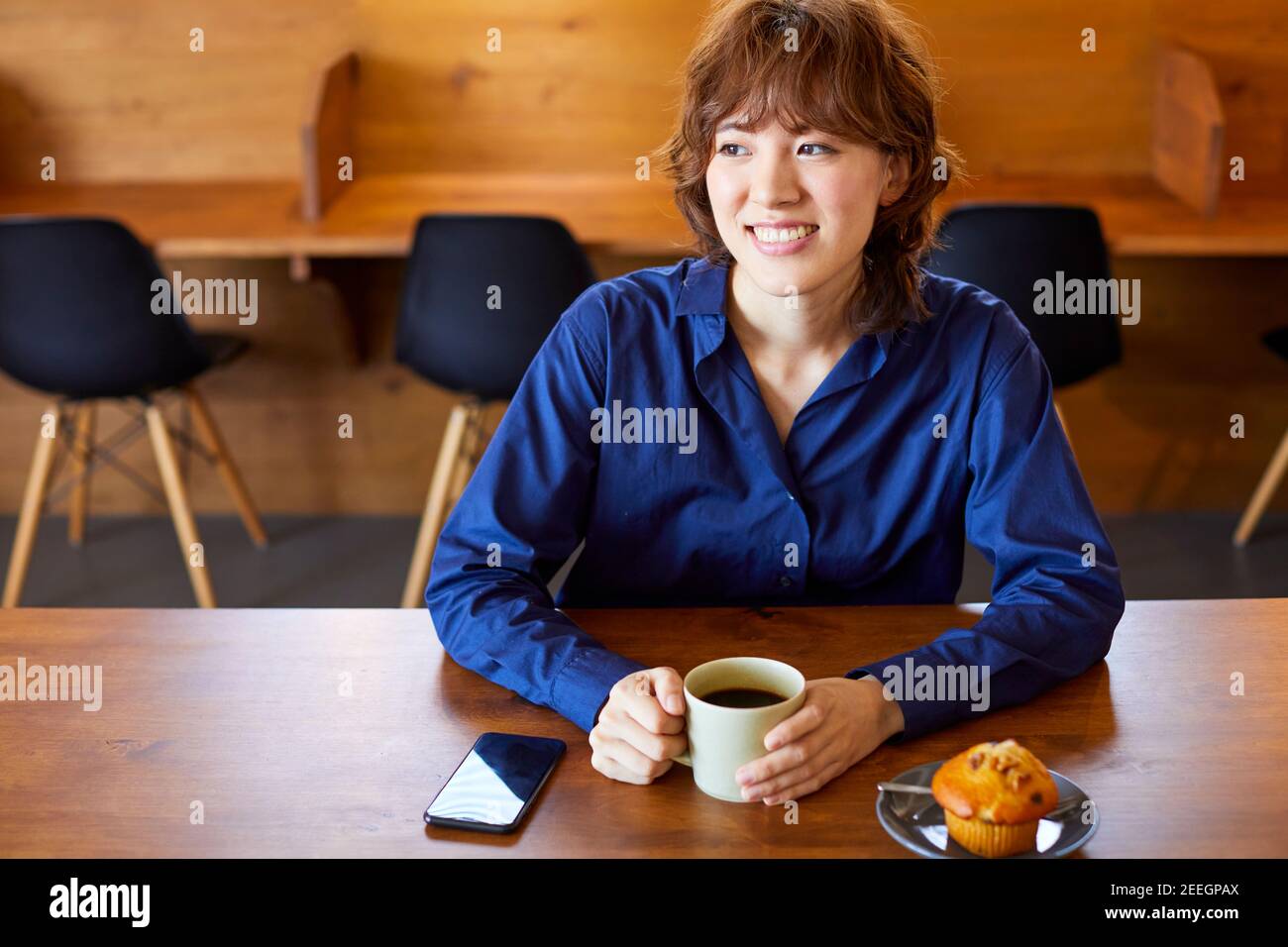 Young Japanese woman at a cafe Stock Photo - Alamy