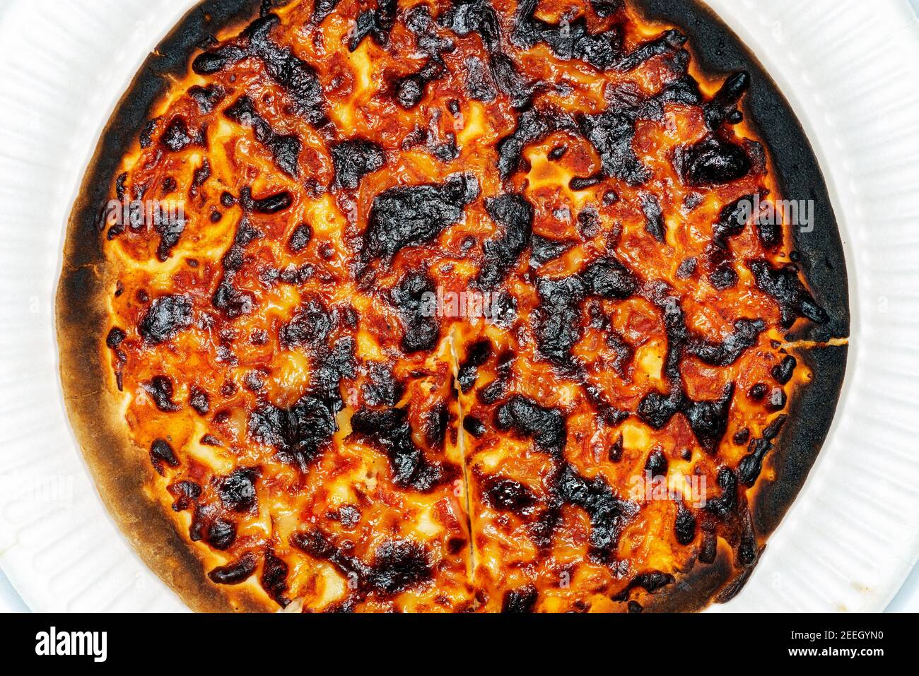 Burnt cheese pizza hires stock photography and images Alamy