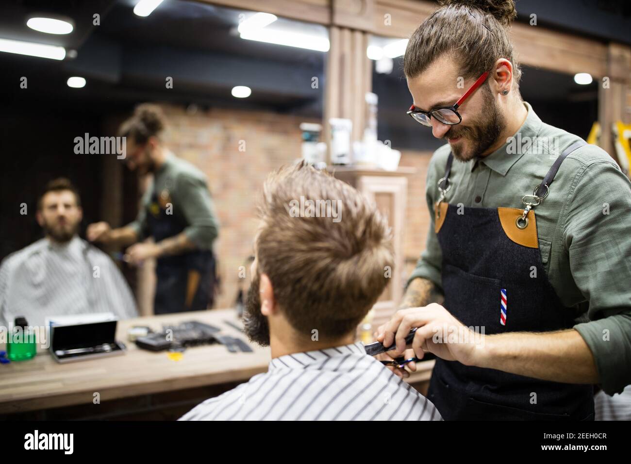 Client during beard and moustache grooming in barber shop Stock Photo Alamy