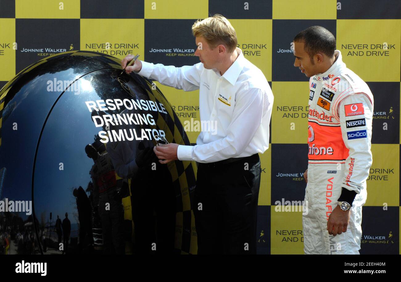 Formula One - F1 - Monaco Grand Prix 2008  - Monte Carlo - 23/5/08  Lewis Hamilton of McLaren (R) and Mika Hakkinen at the launch of a Johnnie Walker Responsible Drinking Simulator at the Monaco Grand Prix  Mandatory Credit: Action Images / Crispin Thruston Stock Photo