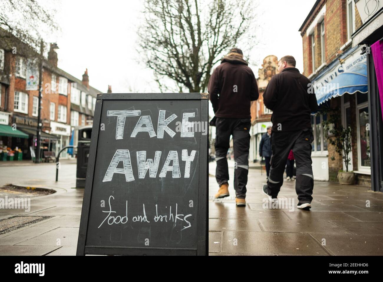 London February, 2021 Pitshanger Lane, a suburban street of shops and houses in Ealing, west