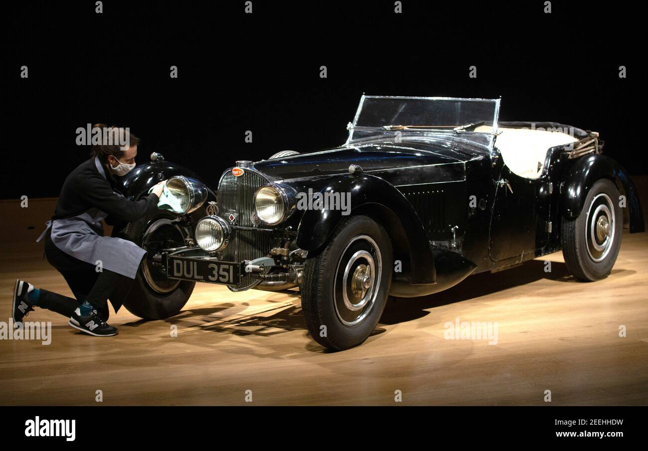 London, UK 16 Feb 2021 1937 Bugatti Type 57S offered for the first time ever at auction, estimate £5-7 Million. This classic car will lead an extraordinary sale of exceptional motor cars at Bonhams' flagship saleroom in London on 19 February 2021. Nicknamed ‘Dulcie' due to its registration number ‘DUL 351' - it has been stored in the garage of its late owner, respected engineer Bill Turnbull, since 1969, and is now offered as an unfinished project, at no reserve. Estimate £5,000,000 - 7,000,000. The Bugatti will form the centrepiece of the 'Legends of the Road Sale'. Stock Photo