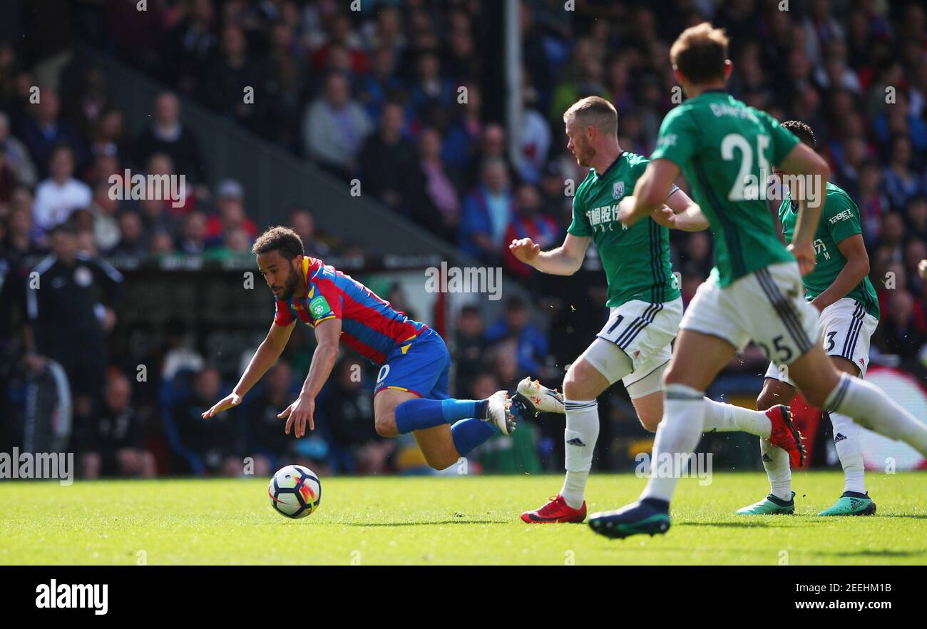 Soccer Football - Premier League - Crystal Palace vs West Bromwich Albion - Selhurst Park, London, Britain - May 13, 2018   Crystal Palace's Andros Townsend is brought to the ground under a challenge from West Bromwich Albion's Chris Brunt    REUTERS/Hannah McKay    EDITORIAL USE ONLY. No use with unauthorized audio, video, data, fixture lists, club/league logos or 'live' services. Online in-match use limited to 75 images, no video emulation. No use in betting, games or single club/league/player publications.  Please contact your account representative for further details. Stock Photo