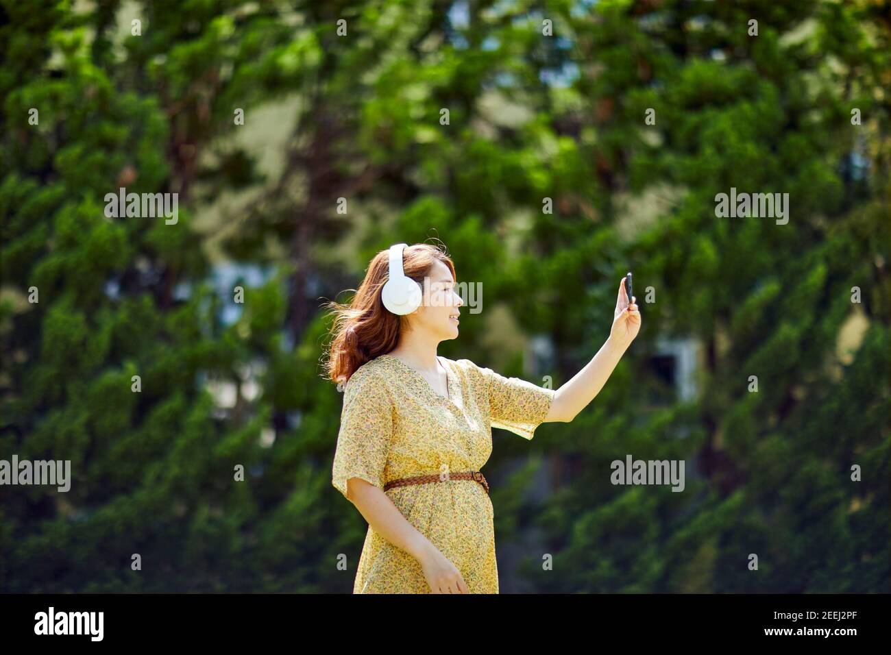Japanese woman relaxing in the garden Stock Photo - Alamy