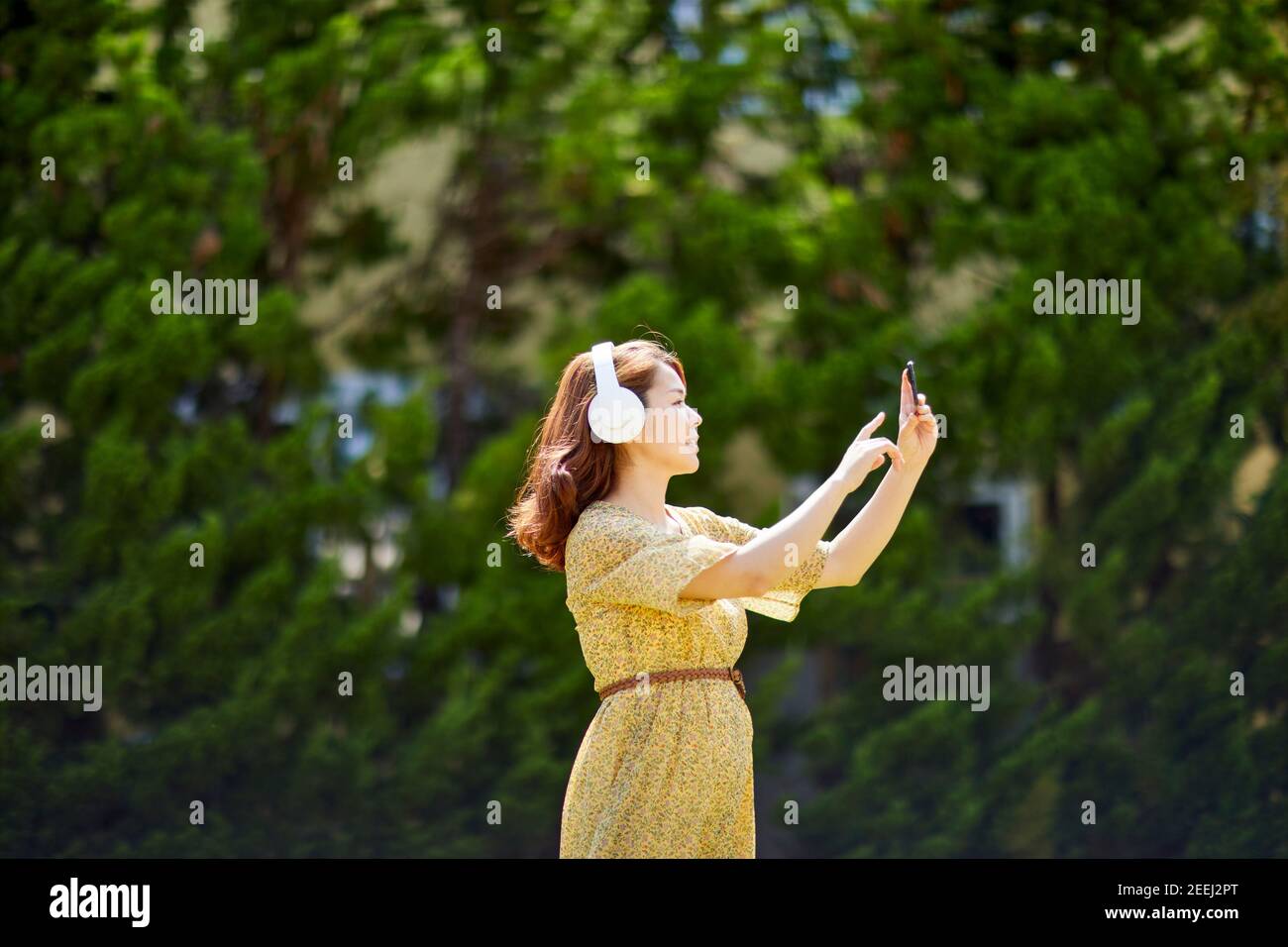 Japanese woman relaxing in the garden Stock Photo - Alamy