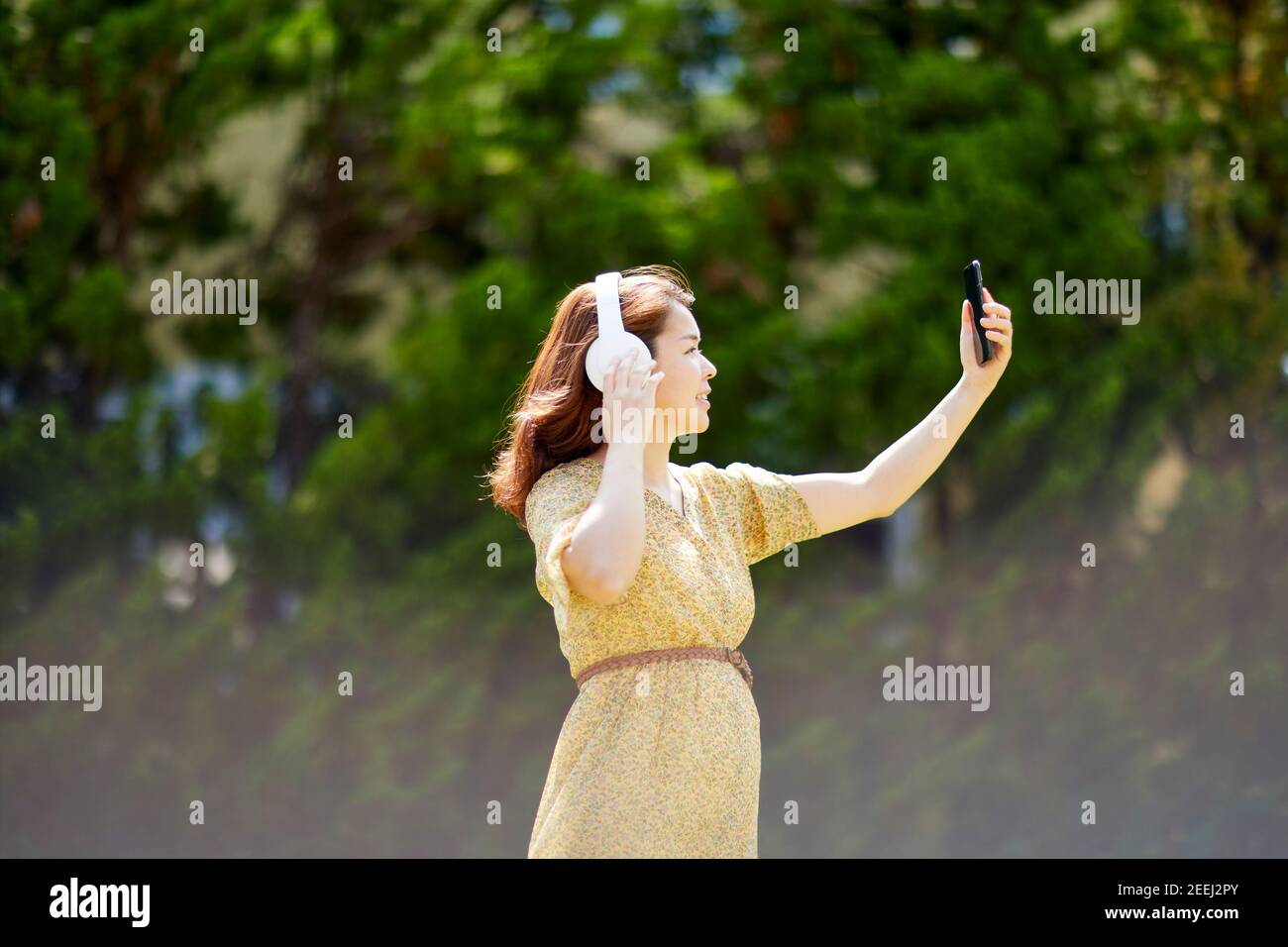 Japanese woman relaxing in the garden Stock Photo - Alamy