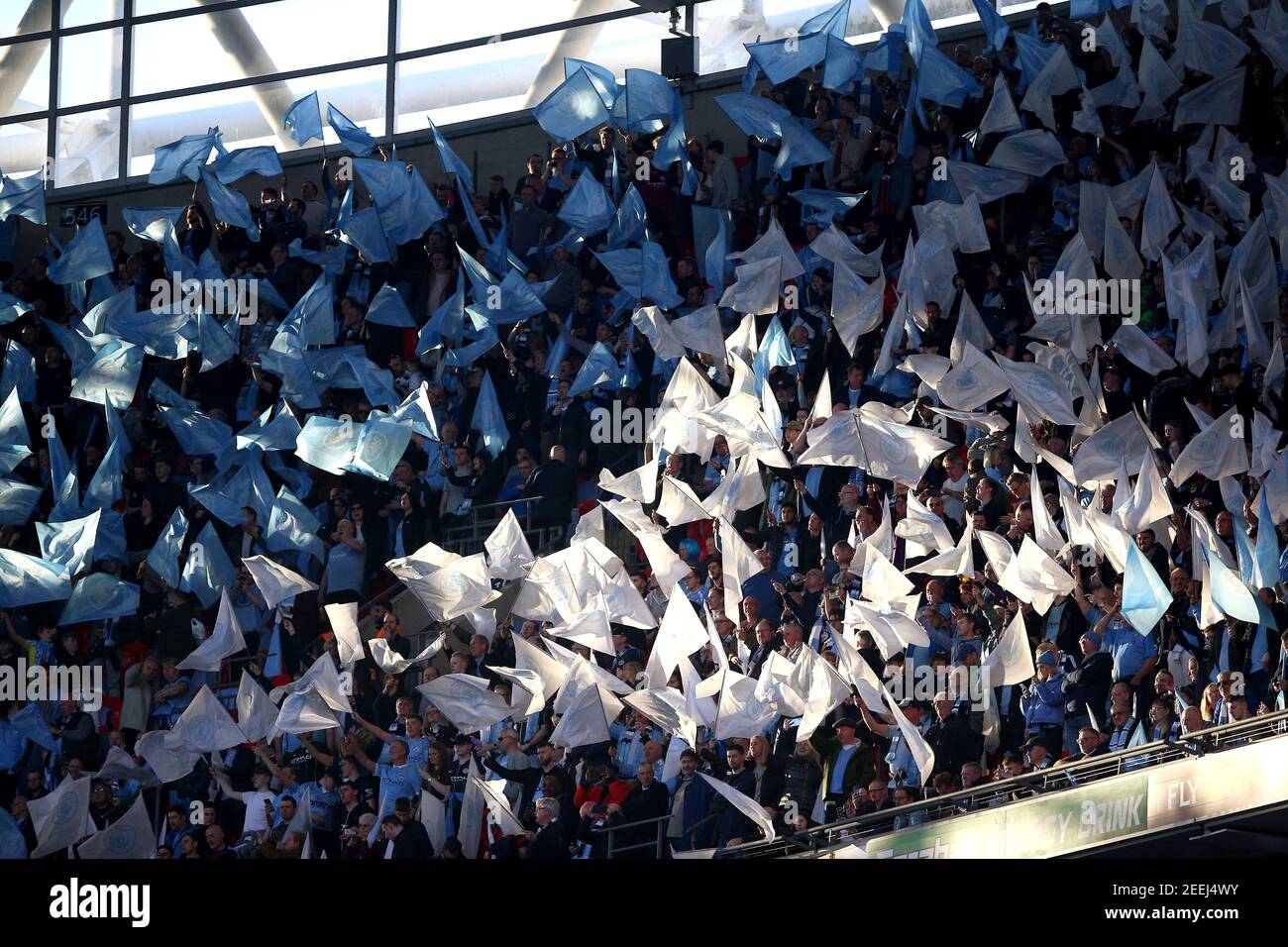 File photo dated 24-02-2019 of fans in the stands waving flags at Wembley Stadium, London. Issue date: Tuesday February 16, 2021. Stock Photo
