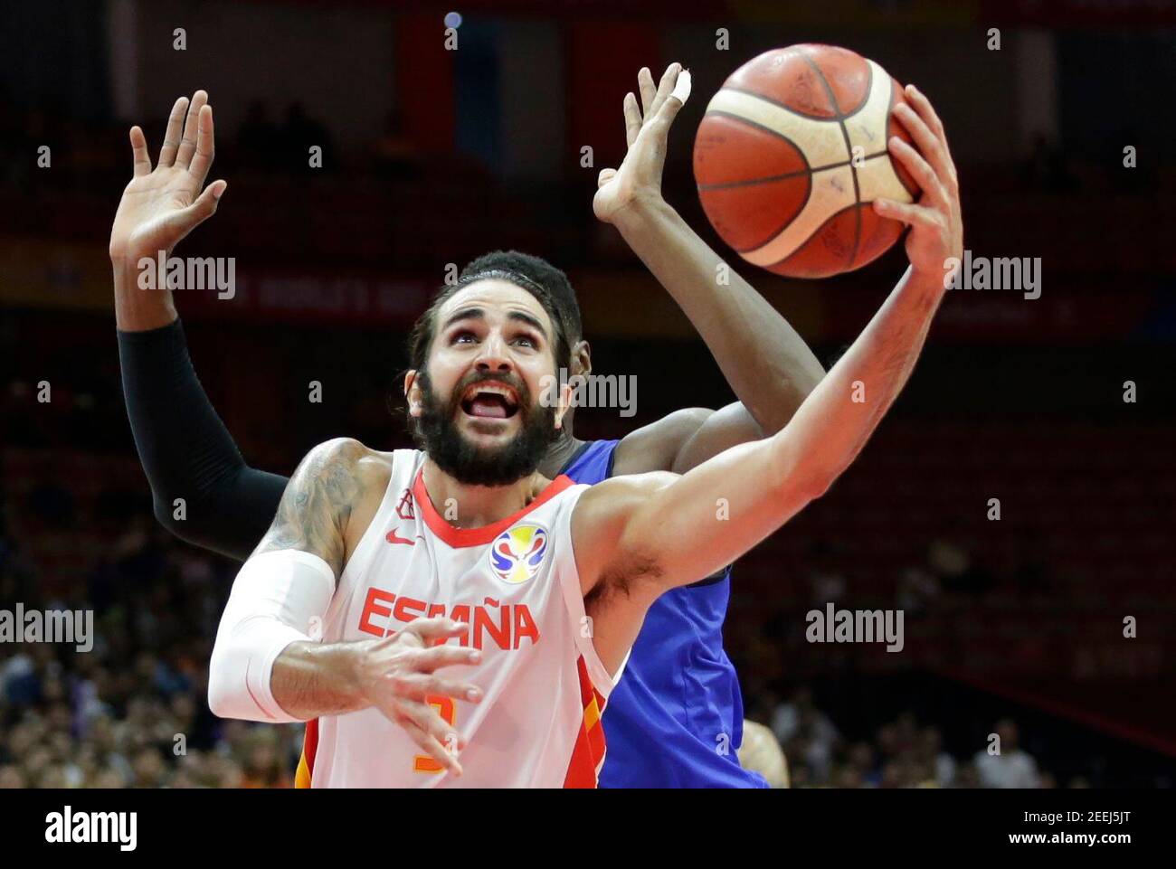 Basketball - FIBA World Cup - Second Round - Group J - Spain v Italy - Wuhan Sports Centre, Wuhan, China - September 6, 2019 Spain's Ricky Rubio in action with Italy's Paul Biligha REUTERS/Jason Lee Stock Photo