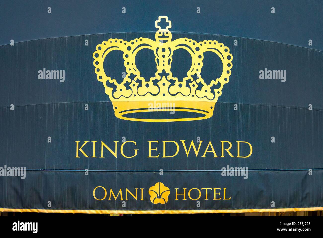 King Edward Omni Hotel black awning with logo and letters. The landmark is  located in downtown Stock Photo