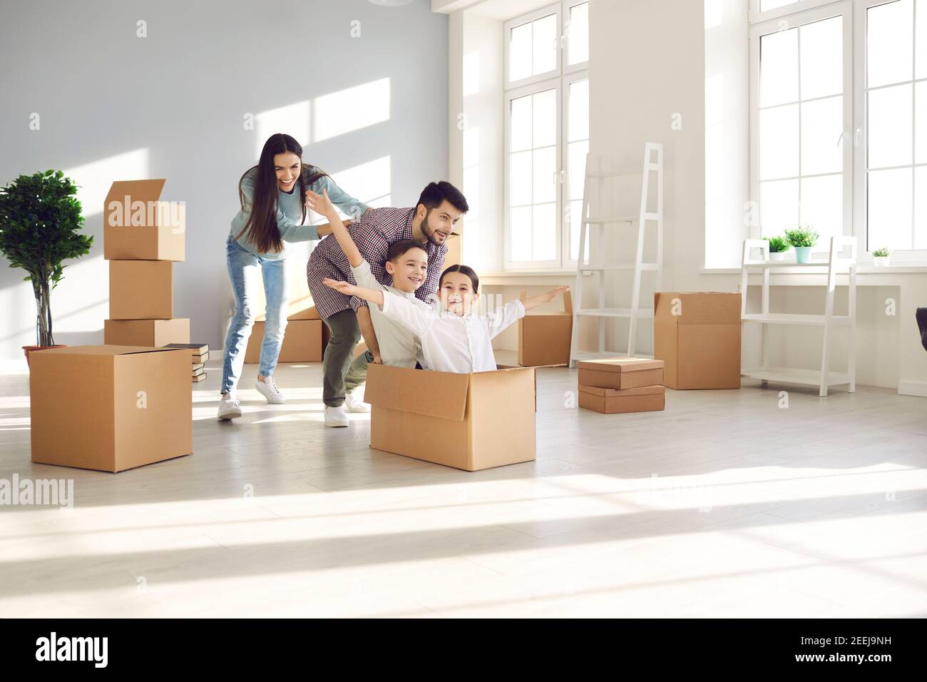Children With Box Children playing in cardboard boxes hi-res stock photography and images ...
