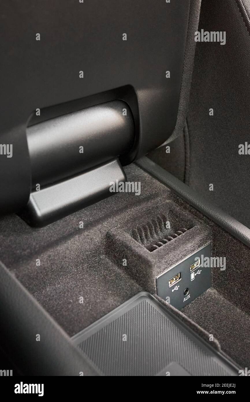 Contemporary car interior element inside of driver seat armrest usb and