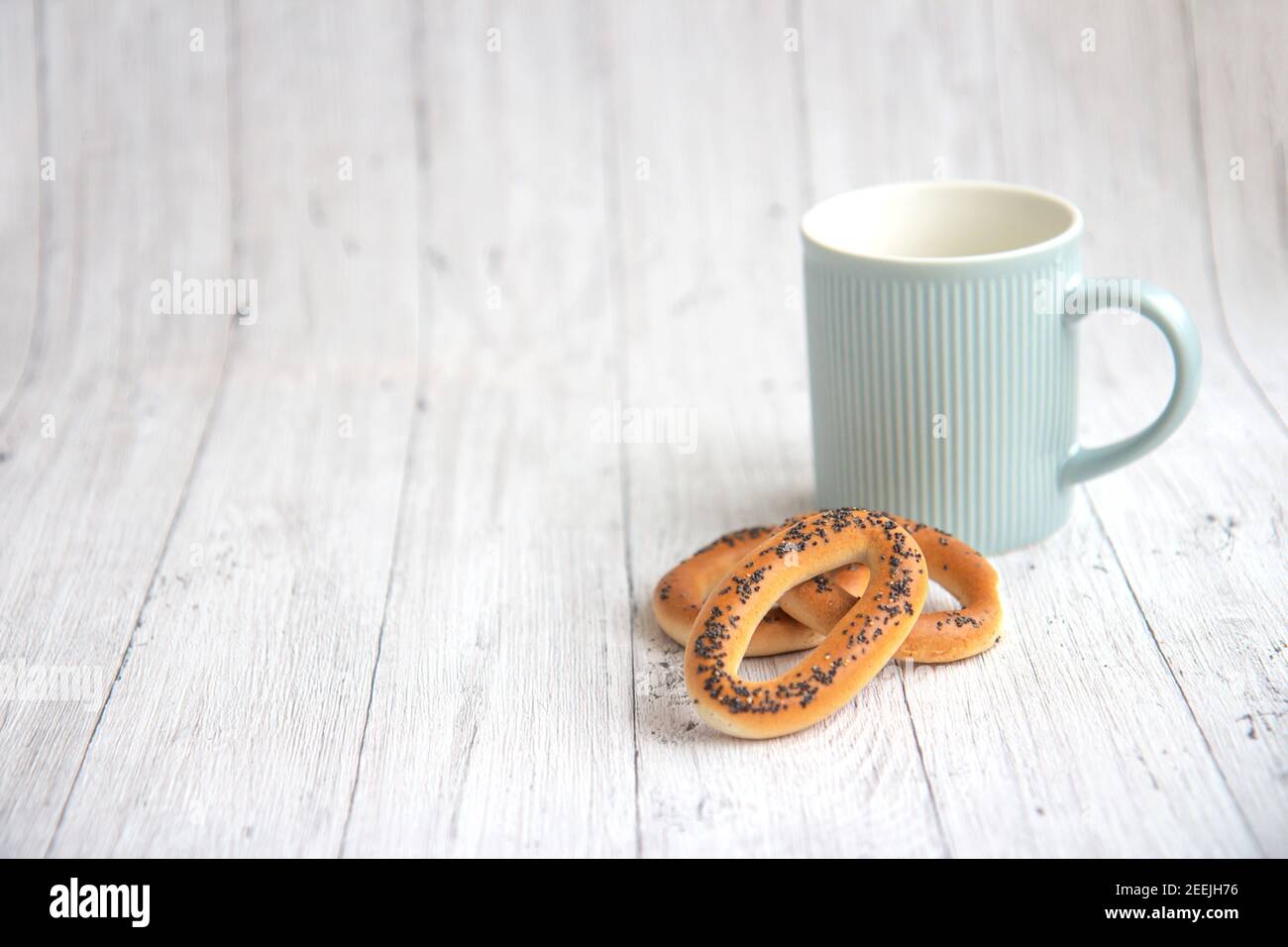 Download Sweet Pretzel With Cup Of Coffee High Resolution Stock Photography And Images Alamy