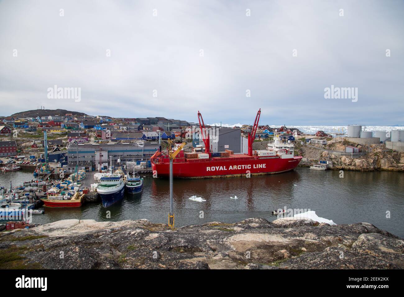 Container Ship in Ilulissat Harbor, Greenland Stock Photo