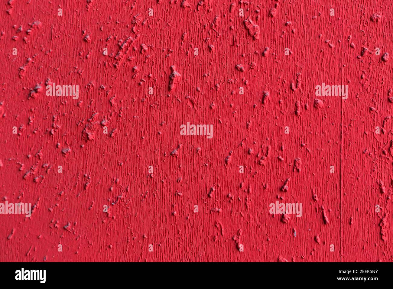 Red painted textured concrete cement wall background Stock Photo
