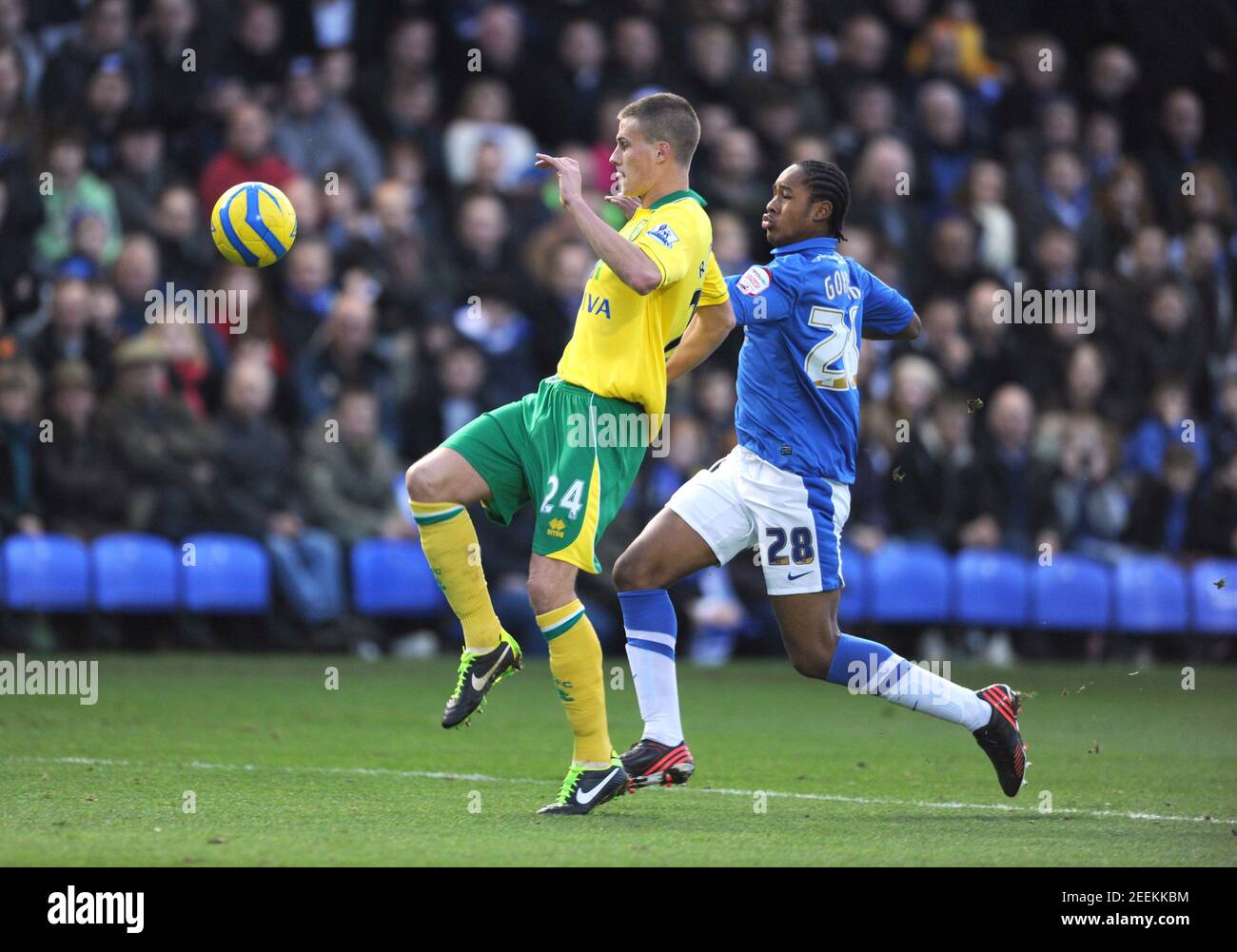 Football - Peterborough United v Norwich City - FA Cup Third Round - London Road - 12/13 - 5/1/13  Norwich City's Ryan Bennett in action against Peterborough United's Jaanai Gordon Hutton   Mandatory Credit: Action Images / Tony O'Brien Stock Photo