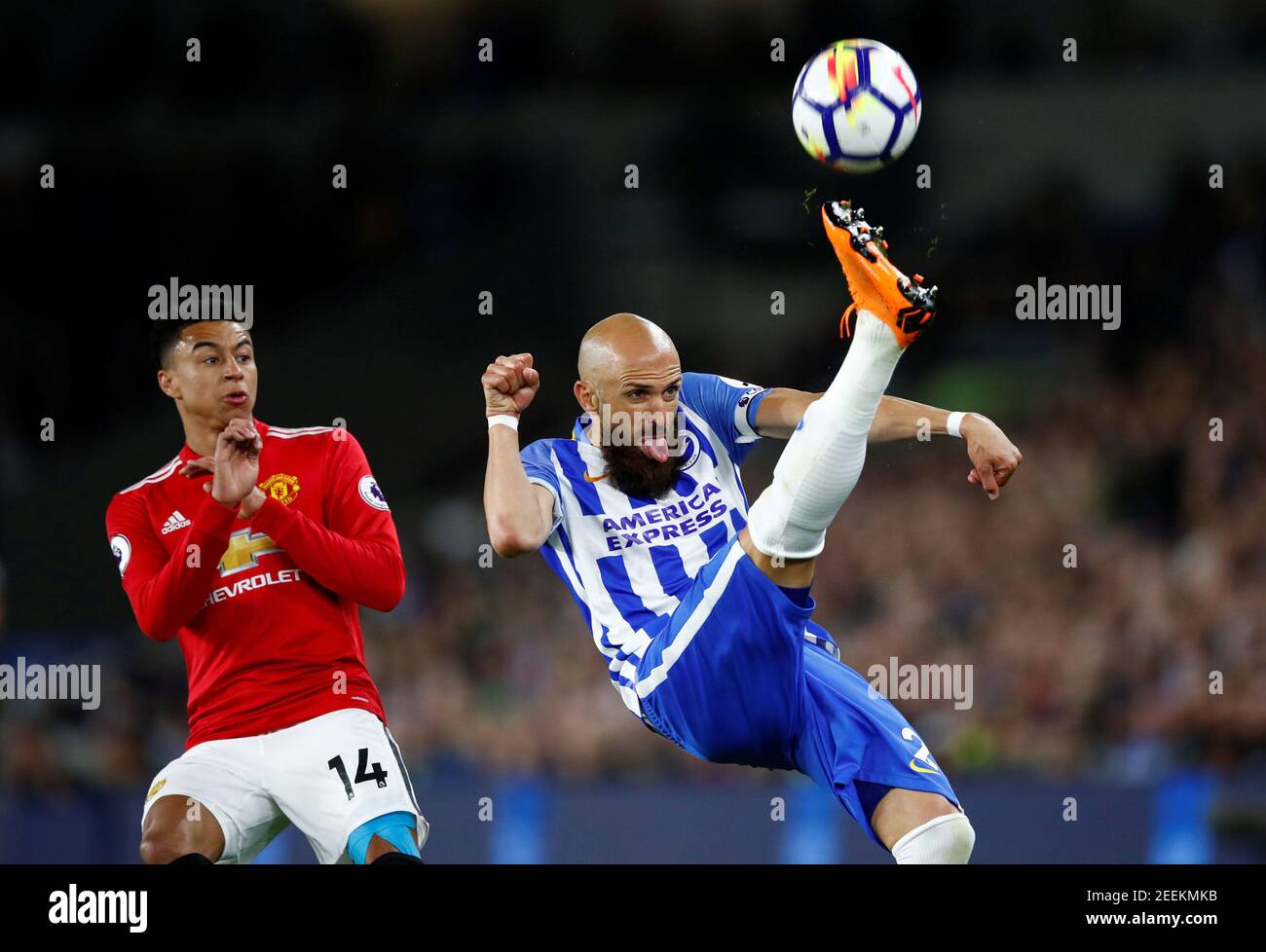 Soccer Football - Premier League - Brighton & Hove Albion v Manchester United - The American Express Community Stadium, Brighton, Britain - May 4, 2018 Brighton's Bruno Saltor in action with Manchester United's Jesse Lingard REUTERS/Eddie Keogh EDITORIAL USE ONLY. No use with unauthorized audio, video, data, fixture lists, club/league logos or "live" services. Online in-match use limited to 75 images, no video emulation. No use in betting, games or single club/league/player publications. Please contact your account representative for further details. Stock Photo