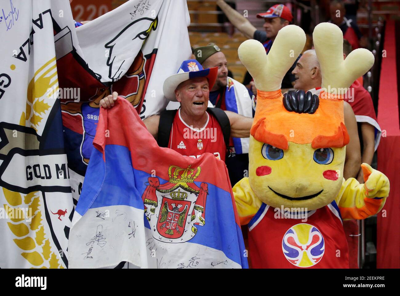 Basketball - FIBA World Cup - Second Round - Group J - Serbia v Puerto Rico - Wuhan Sports Centre, Wuhan, China - September 6, 2019  Serbia fan with the FIBA World Cup mascot before the match REUTERS/Jason Lee Stock Photo