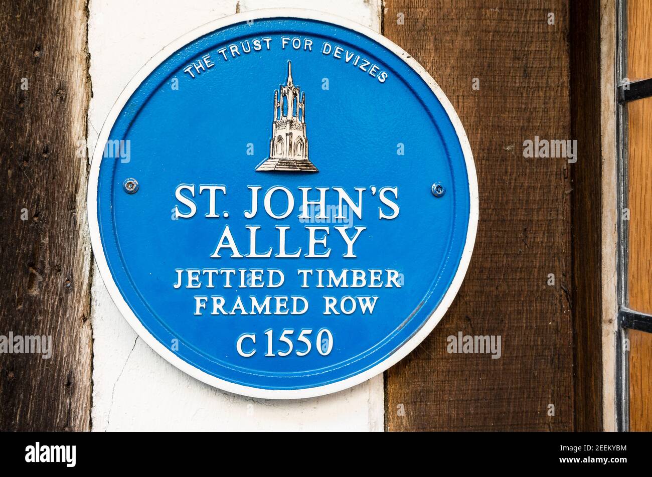 Blue plaque provided by the Trust for Devizes recording the early history of some historic buildings in St James's Alley Devizes Wiltshire England UK Stock Photo