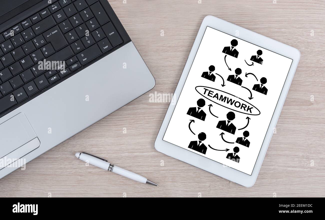 Teamwork concept shown on a digital tablet Stock Photo