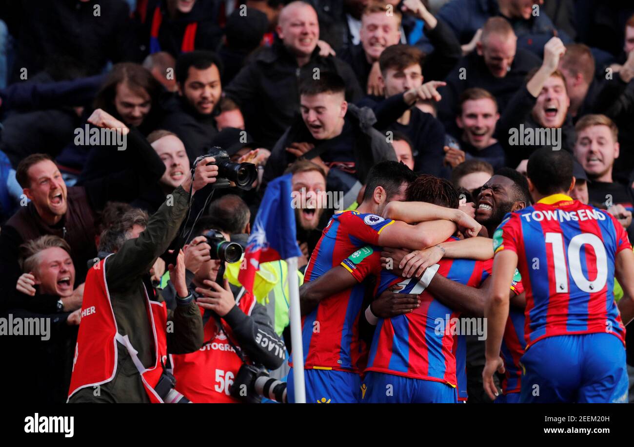Soccer Football - Premier League - Crystal Palace vs West Ham United - Selhurst Park, London, Britain - October 28, 2017   Crystal Palace's Wilfried Zaha celebrates scoring their second goal with team mates and fans    REUTERS/Eddie Keogh    EDITORIAL USE ONLY. No use with unauthorized audio, video, data, fixture lists, club/league logos or 'live' services. Online in-match use limited to 75 images, no video emulation. No use in betting, games or single club/league/player publications. Please contact your account representative for further details.? Stock Photo