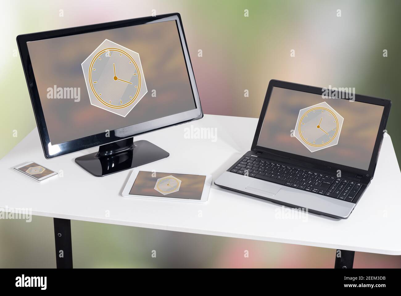 Time management concept shown on different information technology devices Stock Photo