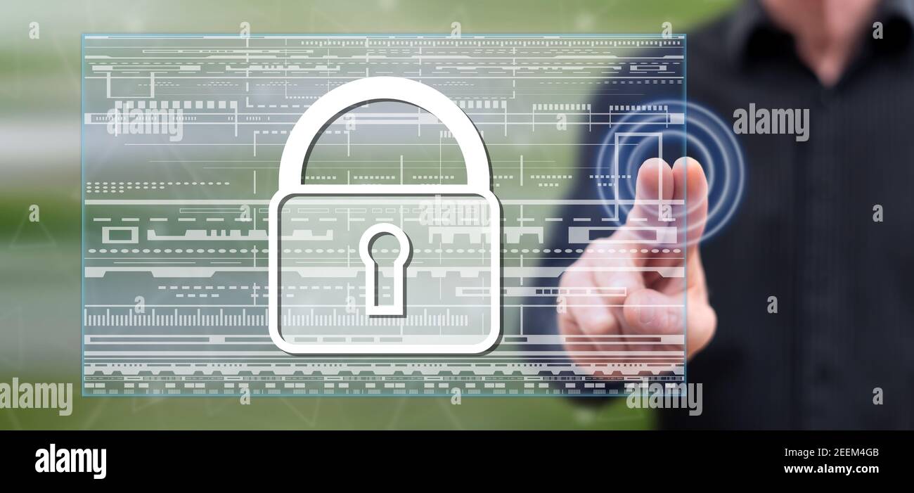 Man touching a data protection concept on a touch screen with his ...