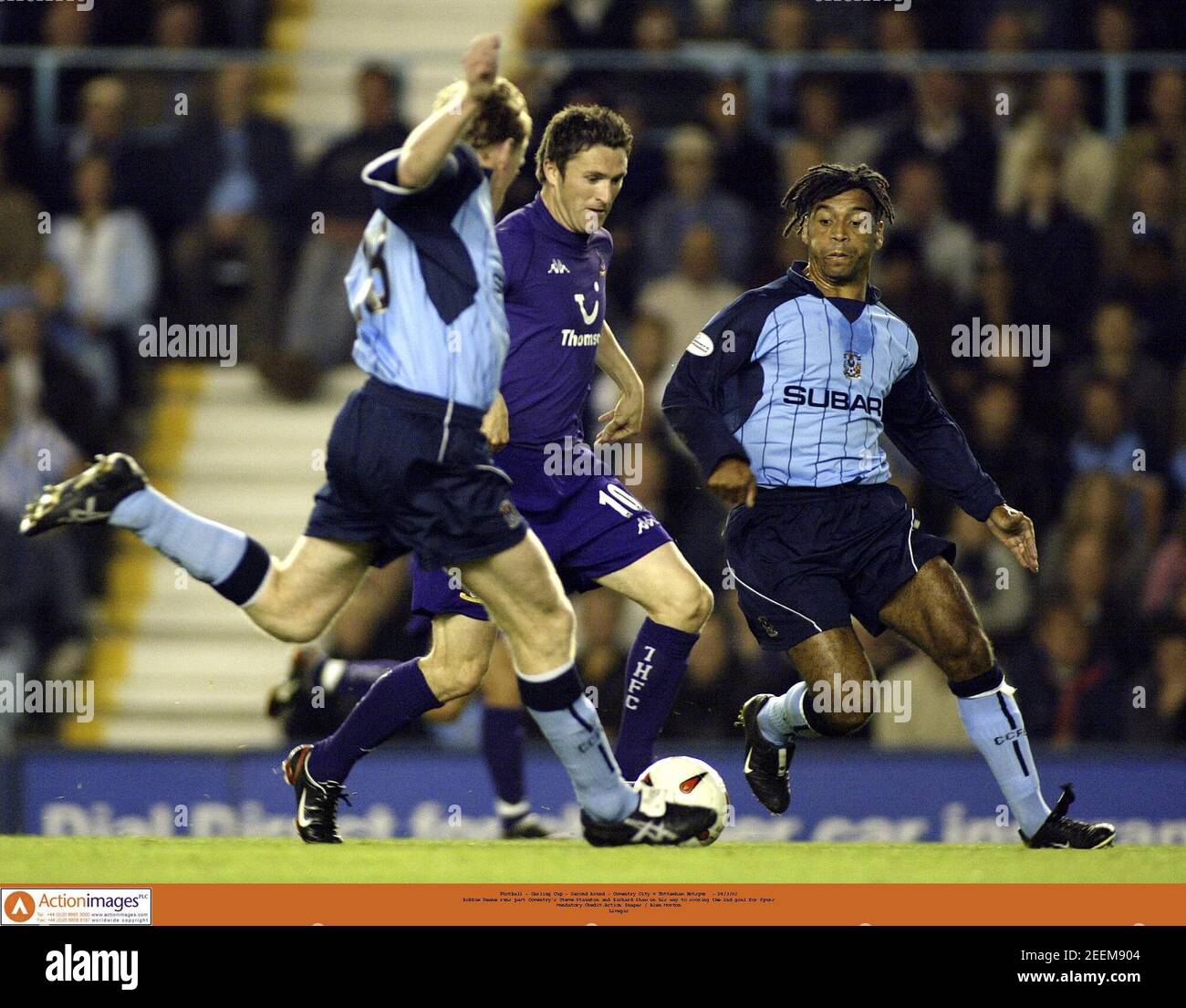 Football - Carling Cup - Second Round - Coventry City v Tottenham Hotspur  - 24/9/03  Robbie Keane runs past Coventry's Steve Staunton and Richard Shaw on his way to scoring the 2nd goal for Spurs  Mandatory Credit:Action Images / Alex Morton  Livepic Stock Photo