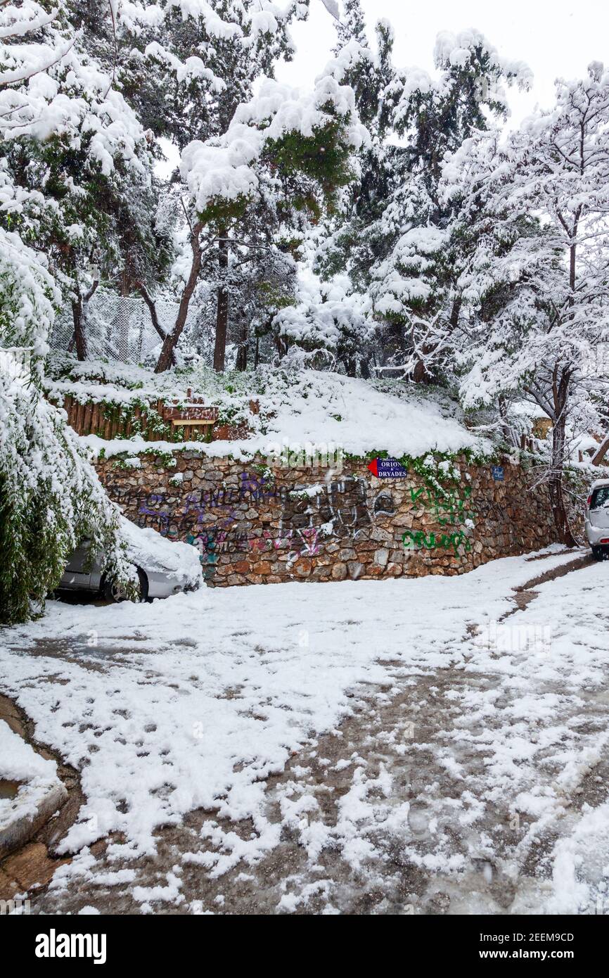 Snowfall in Eksarchia district, in downtown Athens city, the capital of Athens, Greece. Stock Photo