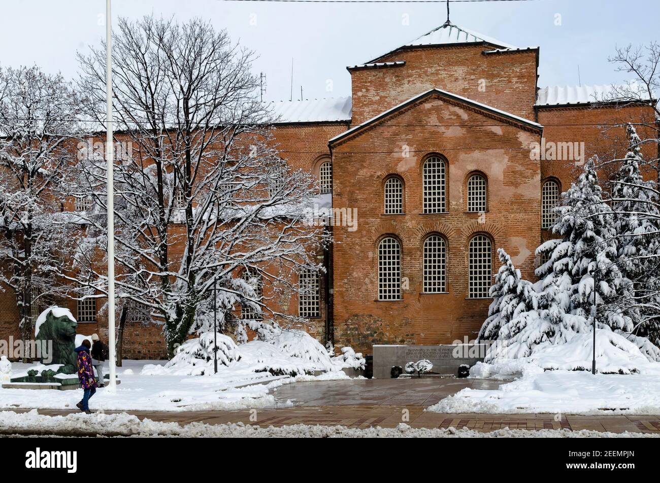Winter scene with the monument to an unknown warrior is located next to the Church of  Saint Sofia, Sofia, Bulgaria Stock Photo
